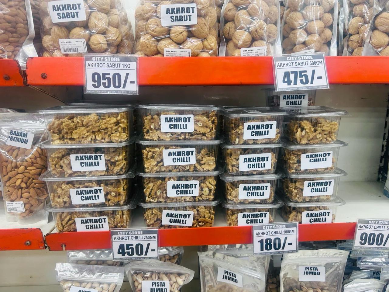 Close-up of fresh akhrot and walnut packs