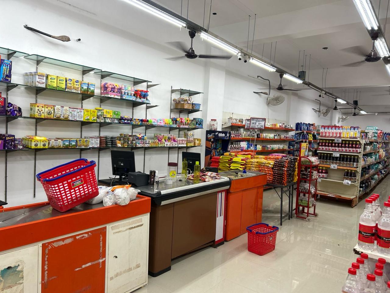 Inside City Store: checkout counters and shelves