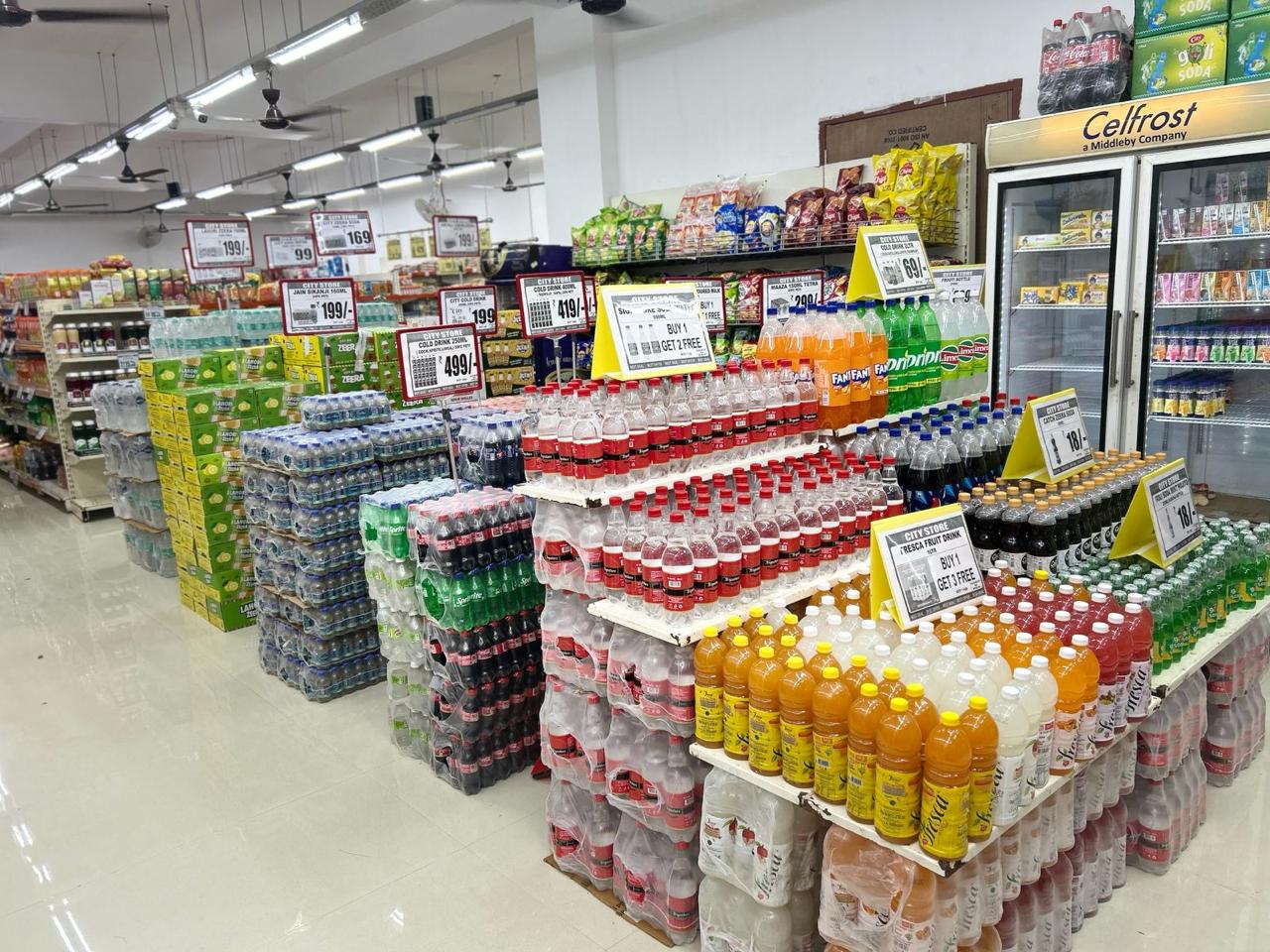 Stacks of soft drink bottles and crates