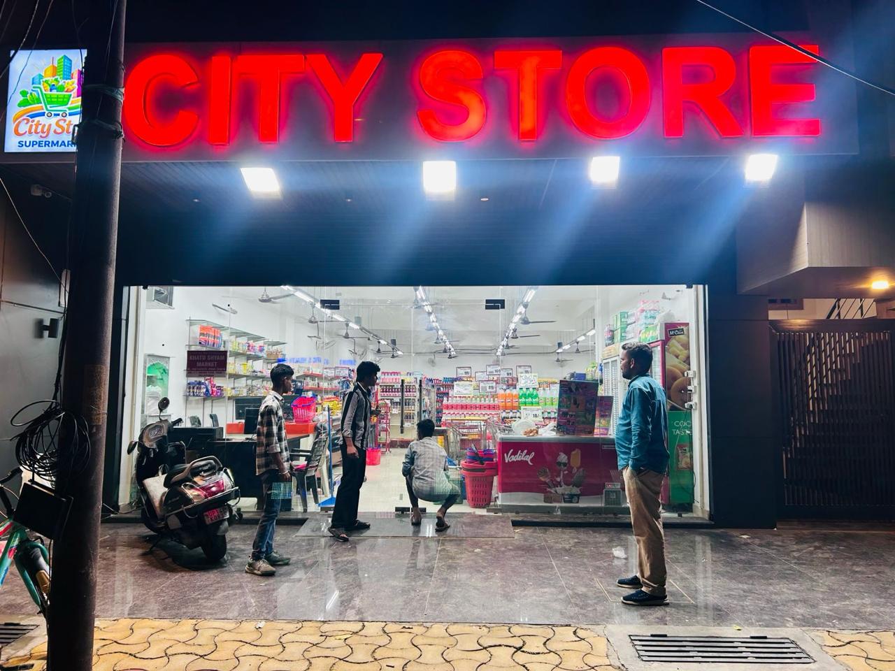 Customers entering City Store Supermarket Meerut in the evening